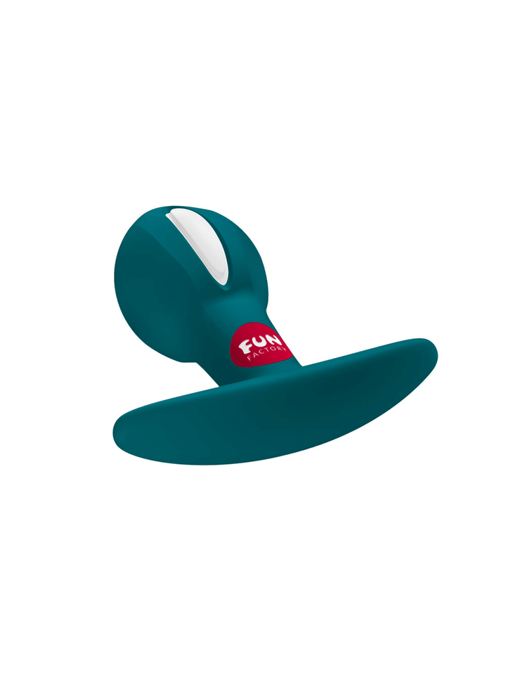 FUN FACTORY B Ball Uno in bottle green angled view highlighting the compact weighted shape and curved base.