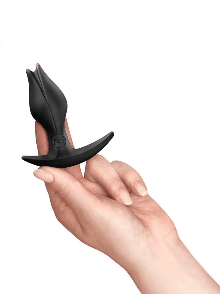 FUN FACTORY Bootie Fem in black shown in hand with compact ergonomic shape.