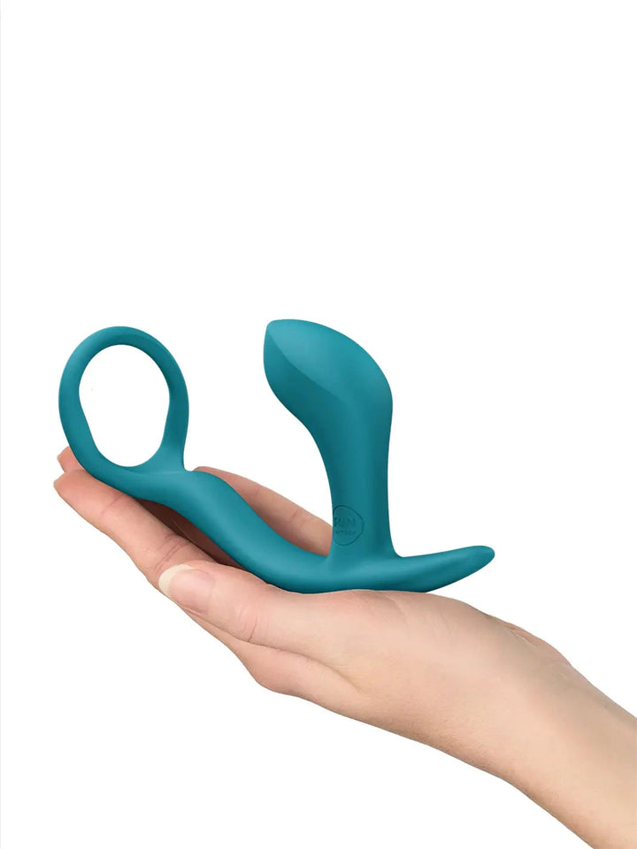 FUN FACTORY Bootie Ring in aquamarine shown in hand with curved silicone plug and ring handle.