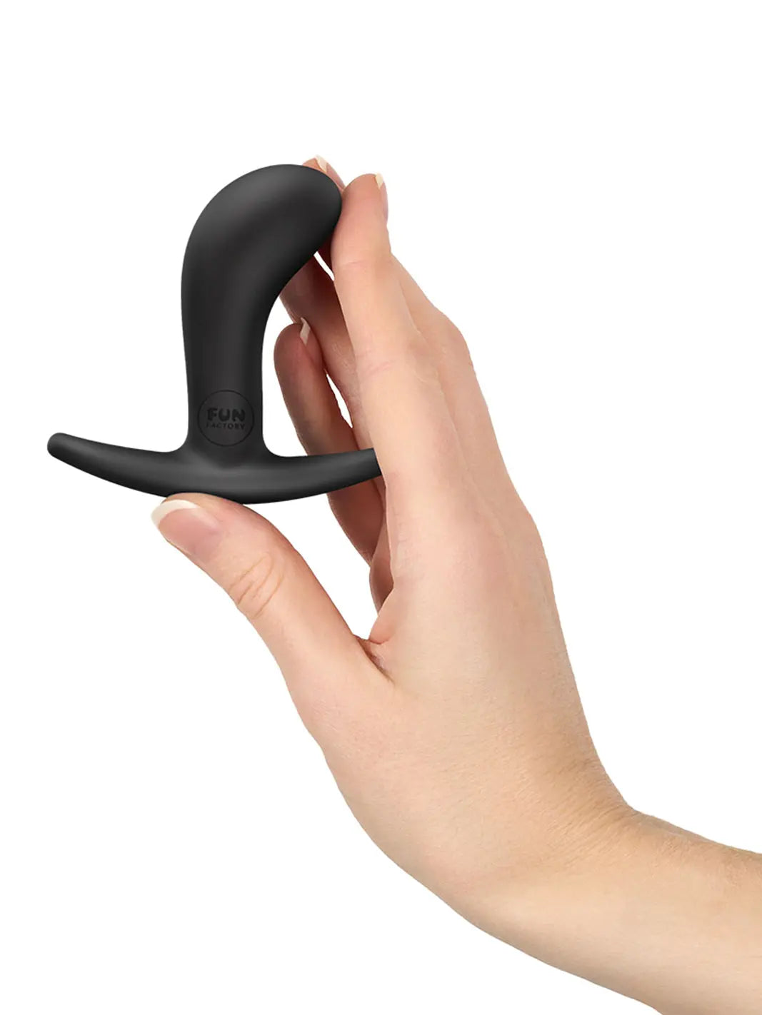 FUN FACTORY Bootie S in black shown in hand with compact silicone design and curved base.
