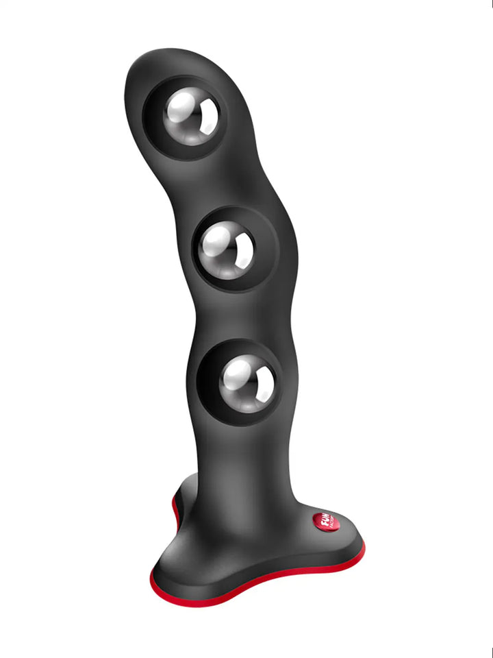 Close-up detail of the textured shape of the FUN FACTORY Bouncer vibro ball silicone dildo in black