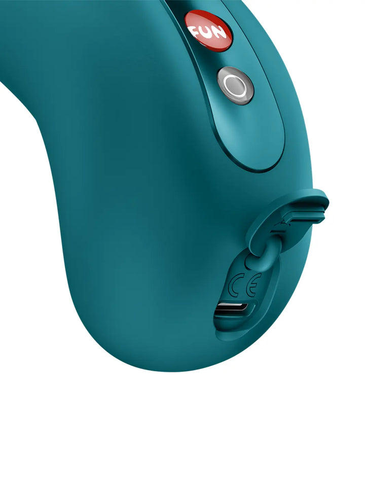 Close-up of FUN FACTORY Cherie in teal showing the control buttons and charging port detail.