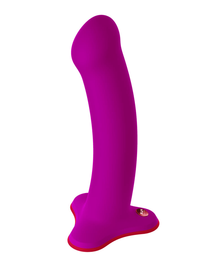 FUN FACTORY Magnum in magenta side angle with smooth curved shape and sculpted base.