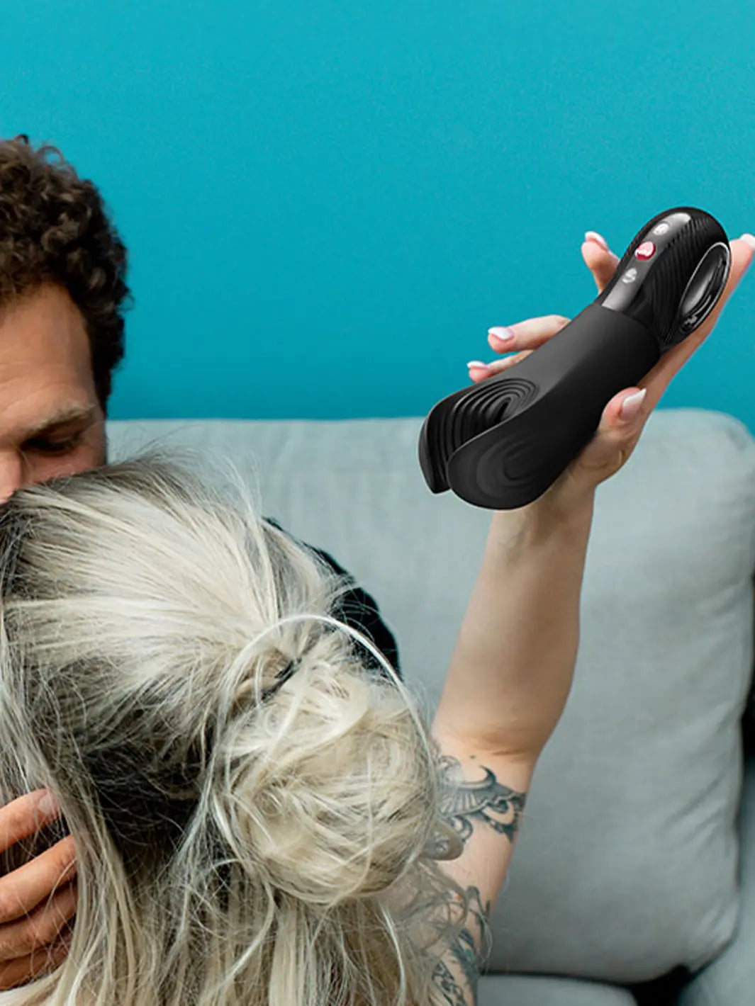 Fun Factory MANTA black male massager in a lifestyle setting