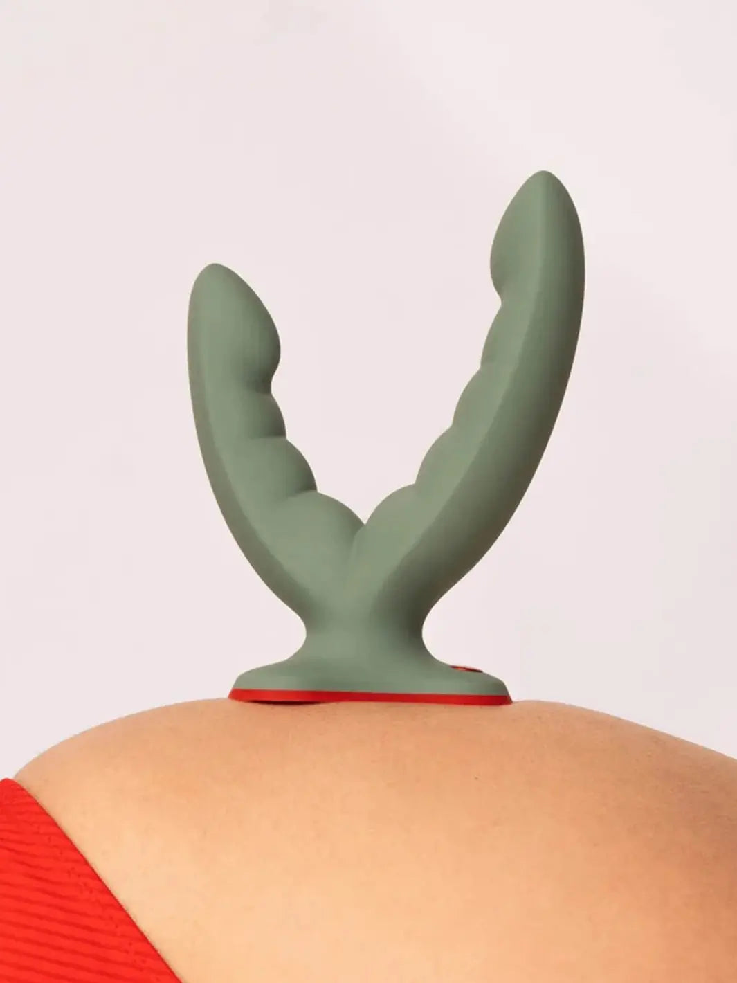 FUN FACTORY Ryde dual stimulation grinding dildo in Wild Olive styled in a lifestyle image