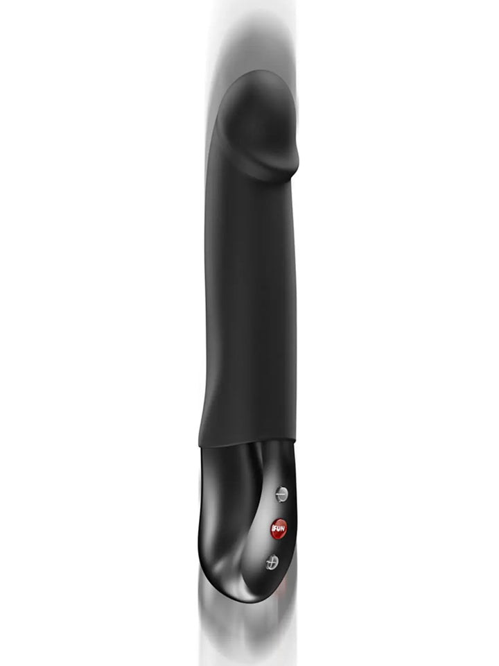 FUN FACTORY Stronic Real in bottle green motion view highlighting the thrusting design and sleek profile.