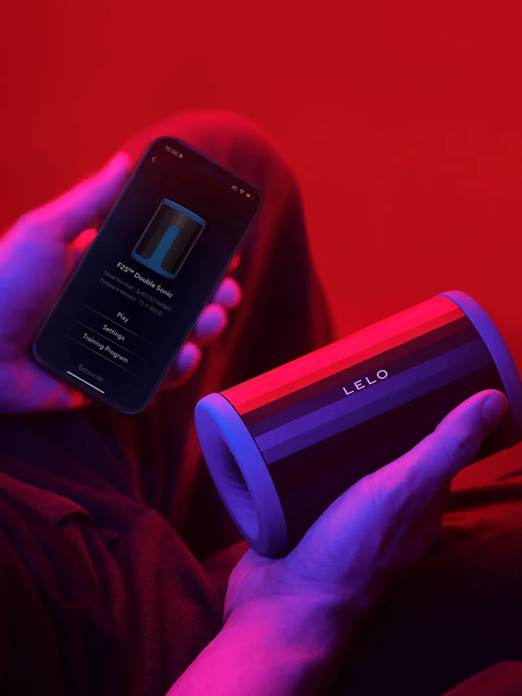 LELO F2S Double Sonic lifestyle image shown in hand with bold lighting and premium compact design.