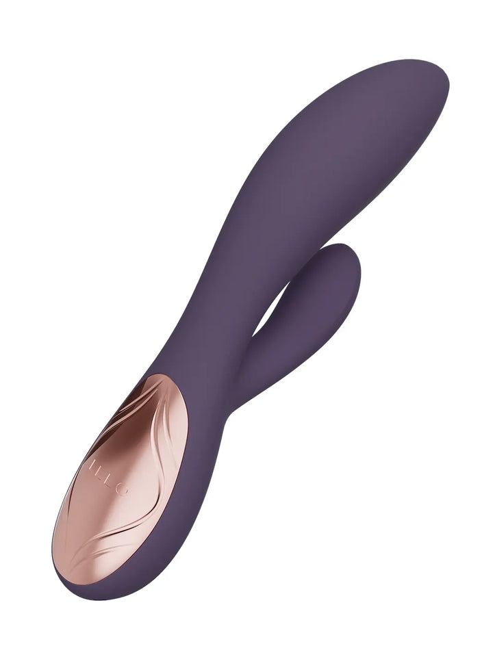 Close-up of LELO Ina Thrust purple showing curved shape and rose gold control detail.
