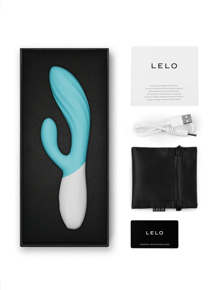 LELO Ina Twist in aqua shown with product box, charging cable, pouch and care card.