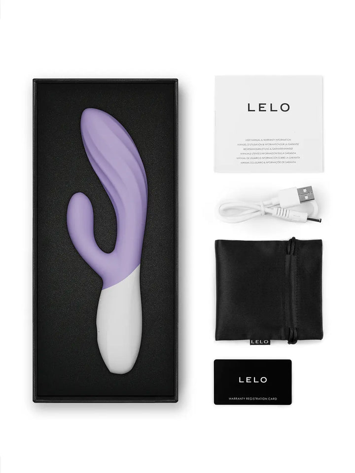 LELO Ina Twist in lavender shown with product box, charging cable, pouch and care card.