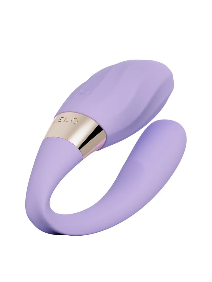 LELO Tiani Twist couples vibrator in Soft Pink with curved dual-action design and gold accent band