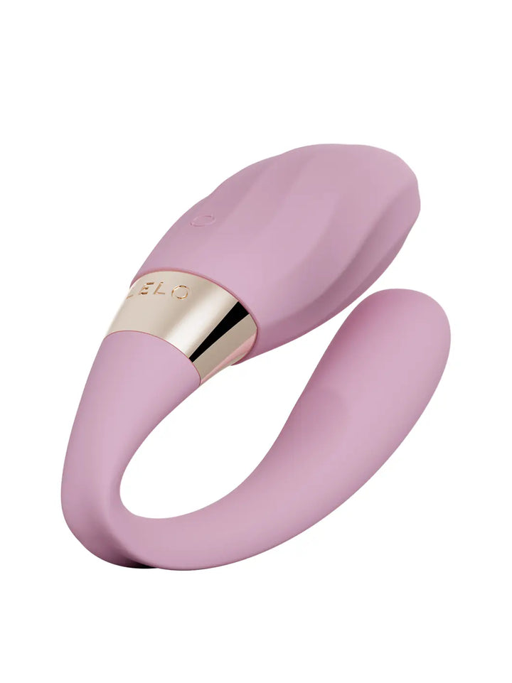 LELO Tiani Twist couples vibrator in Soft Pink with curved dual-action design and gold accent band