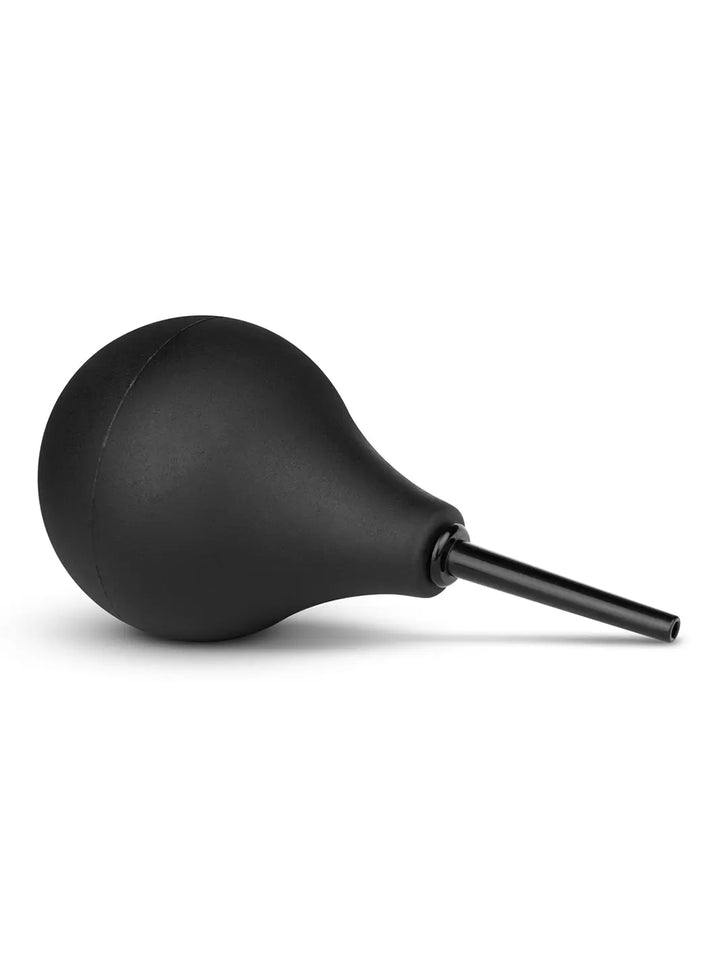 Nexus Anal Douche in black side view highlighting the rounded bulb shape and slim nozzle.