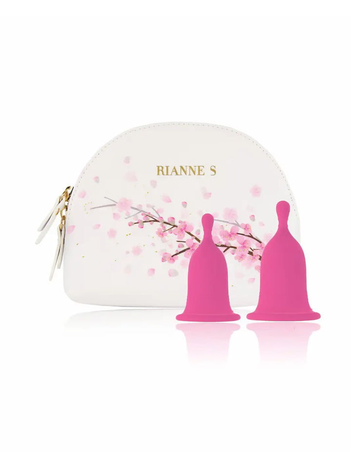 Rianne S Femcare Cherry Cup set shown with two pink cups and floral storage pouch.