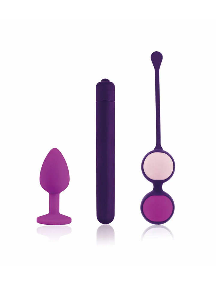 Rianne S RS Essentials First Vibe Kit featuring a plug, slim vibrator and dual ball exerciser in purple tones.