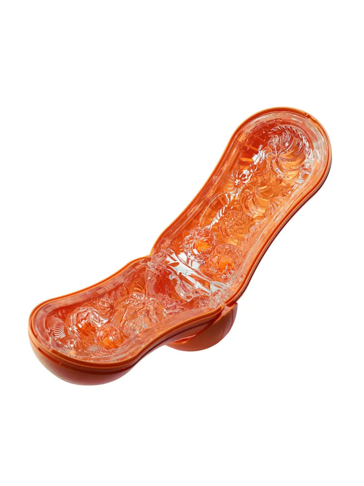 TENGA Flip Orb Sunset Orange open view showing soft internal orb texture and spiral design.