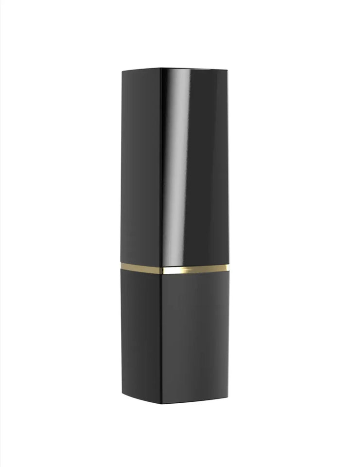 Womanizer Beauty in black and gold closed view showing discreet lipstick-style cover and elegant finish.