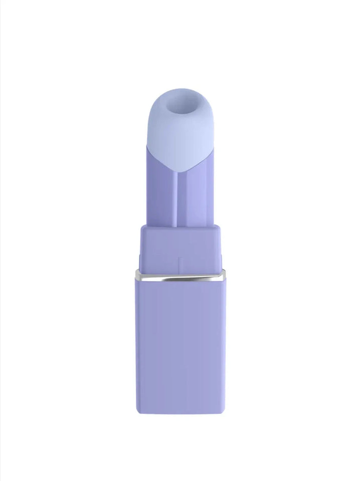 Womanizer Beauty in lilac front view with compact lipstick-inspired shape and smooth premium finish.