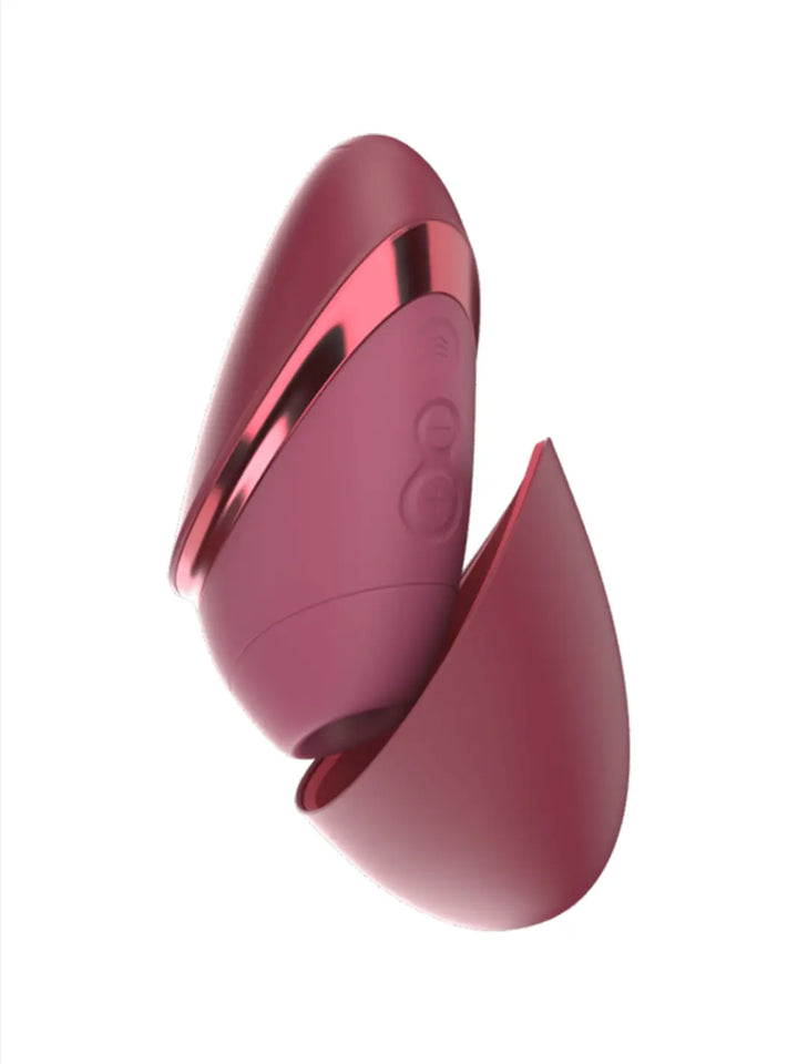 Womanizer Next Liberty in Bordeaux main view with compact curved design and metallic accent detail.