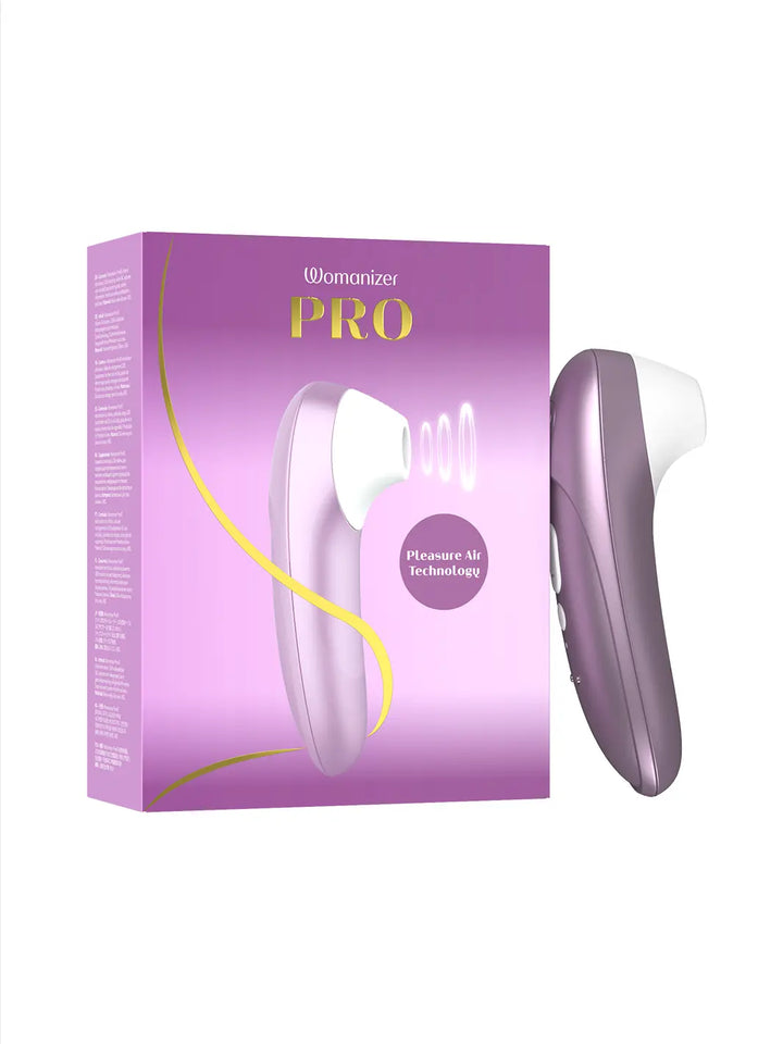 Womanizer Pro lilac displayed beside its matching product packaging.