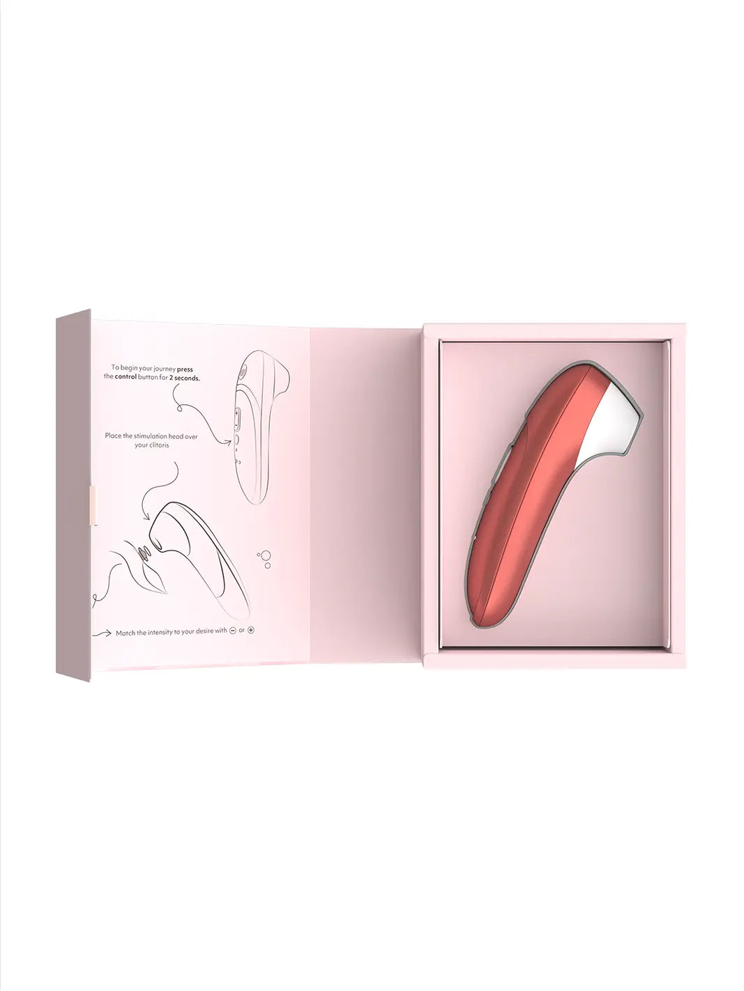 Womanizer Pro red shown with open box packaging and product insert.