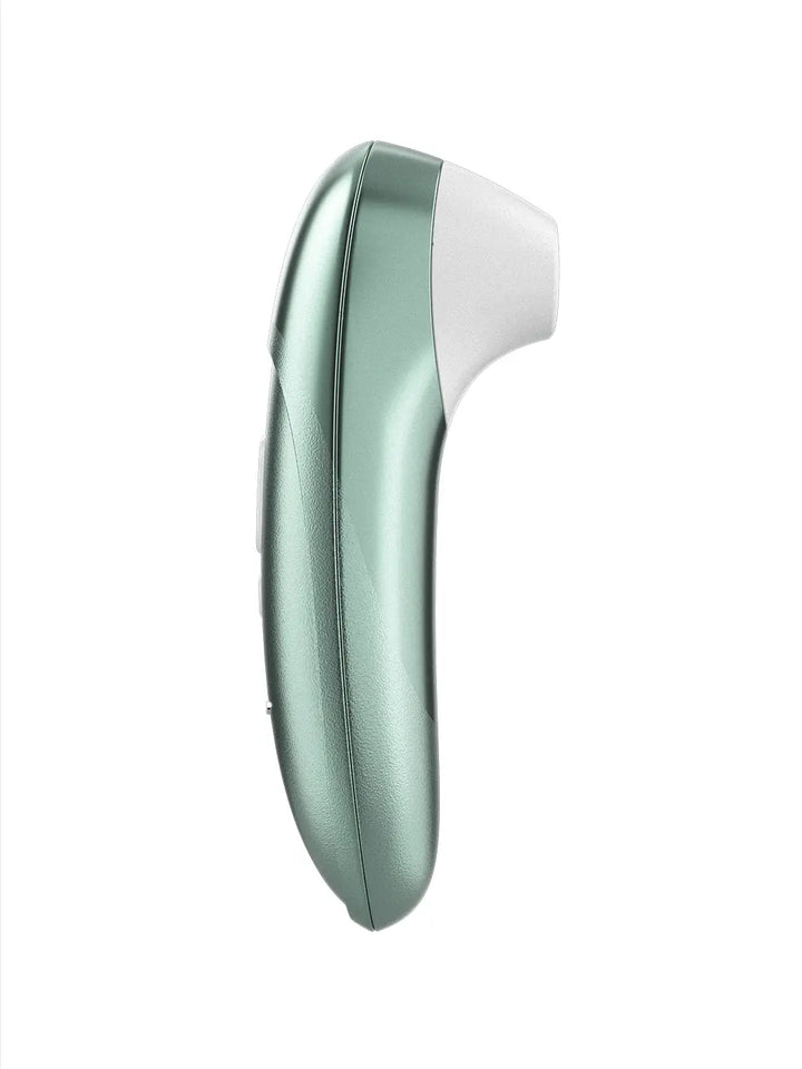 Womanizer Pro sage green side view showing its slim ergonomic curve.