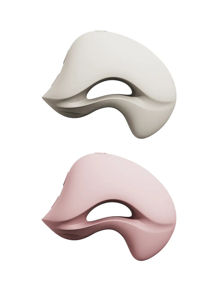 ZALO Mochi in blush pink side view highlighting the curved dual-head shape and open centre design.