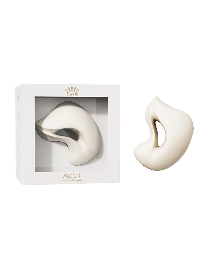 ZALO Mochi in ivory side view highlighting the curved dual-head shape and open centre design.
